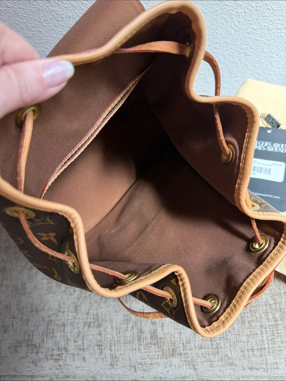 Louis Vuitton Monogram Canvas Backpack in Brown and Tan Leather Trim
